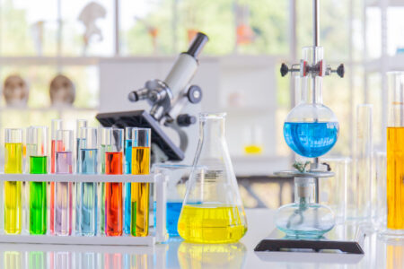 Chemical reagents in glass bottles of various shapes, scientific experiments of various sizes.